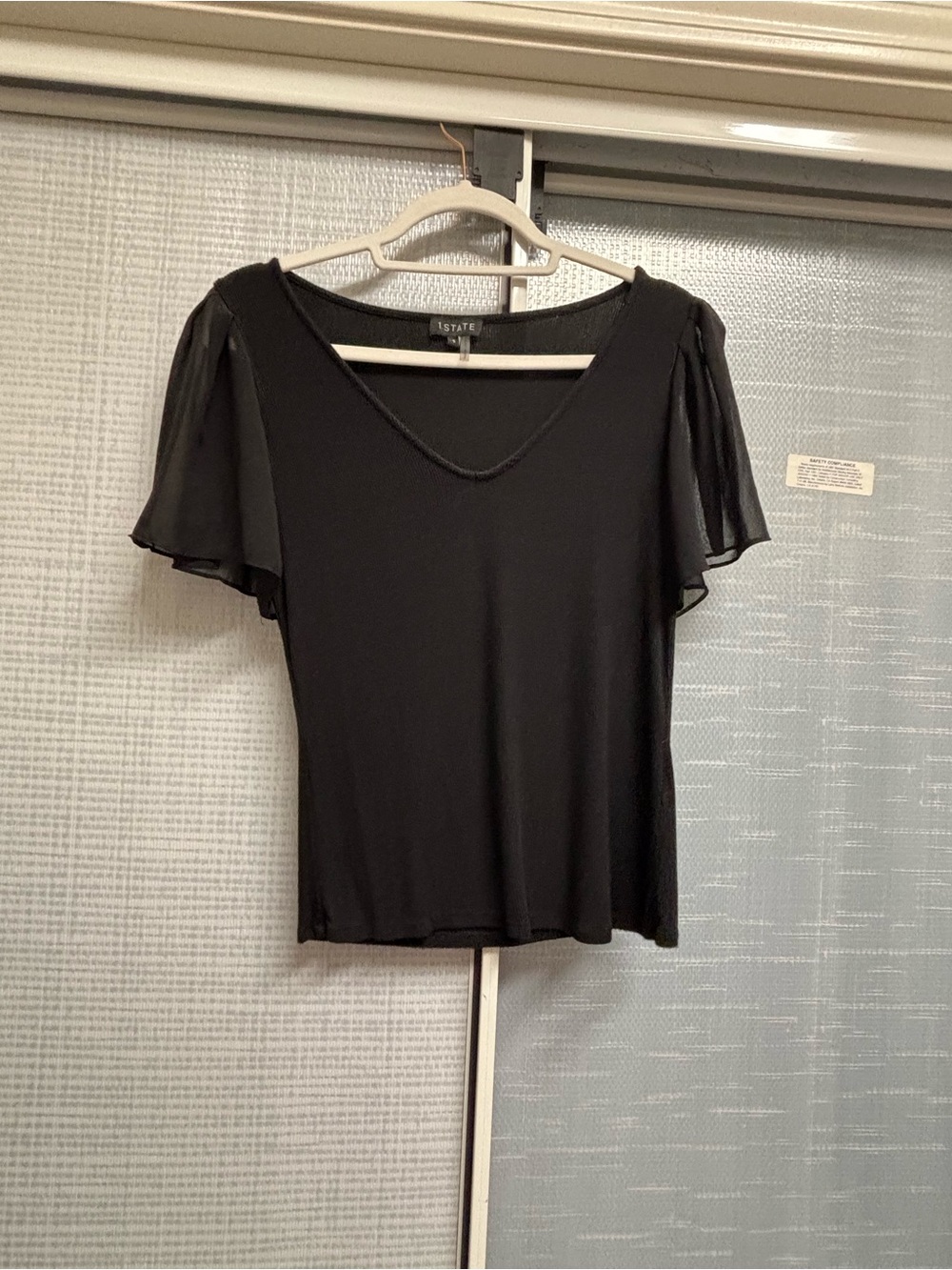 1. State Black V-Neck Flutter Sleeve Top